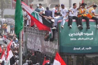 بالصور.. استقبال شعبي ضخم لـ"العراق المونديالي" في بغداد