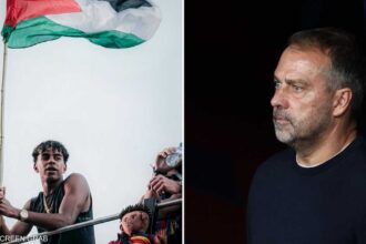 لامين يامال يحمل علم فلسطين احتفاءً بتتويج برشلونة بالدوري الإسباني.