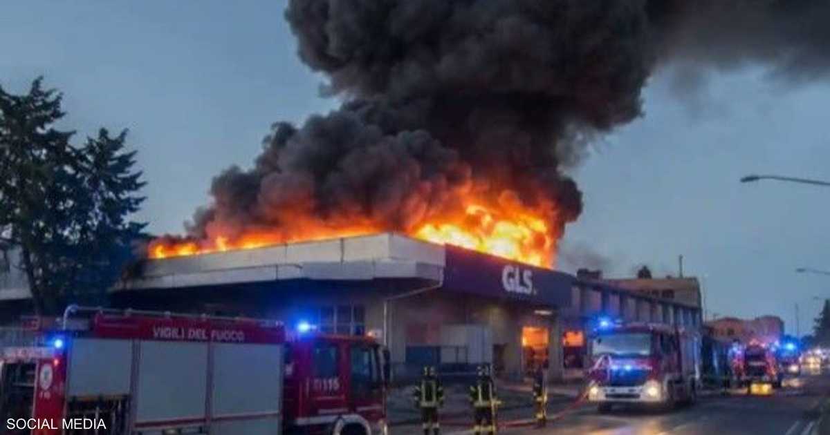مستودع شحن يشتعل بالحريق ويؤدي إلى انفجارات متتالية وسحابة دخان ضخمة