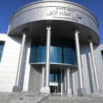 المتصل الوهمي يعرض مالاً للاستيلاء على أمر قبض في العراق